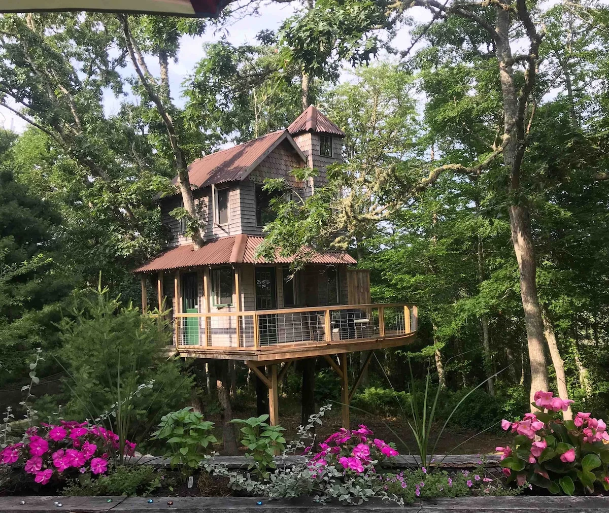 This Cape Cod treehouse is 12 feet up — and reached by a suspension bridge
