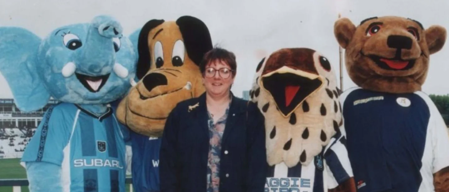Angela Hallam has made football mascots at home for nearly 40 years. William Hunt, 15, fed the calves before school and after.