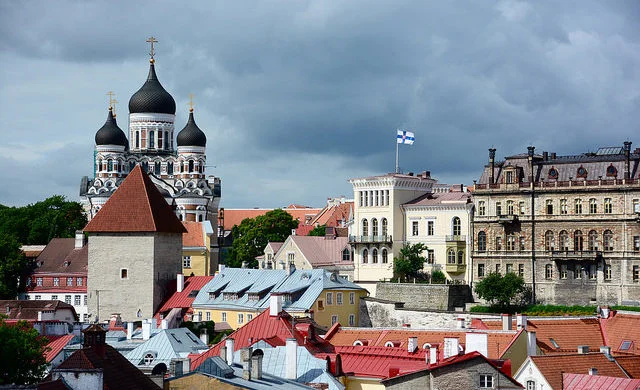 Tallinn old town, Estonia — medieval stone towers and red-roofed buildings against an overcast sky