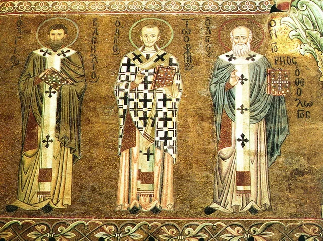 A mosaic of three haloed bishops in patterned vestments, each holding a jewelled book