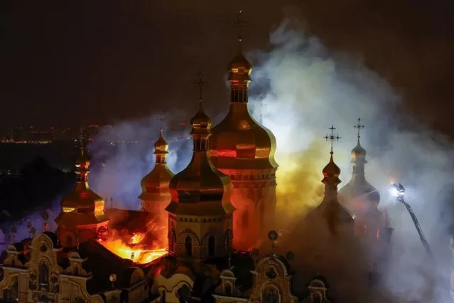 Firefighters at Kyiv Pechersk Lavra after the Russian strike