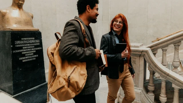 Students talking in a university corridor
