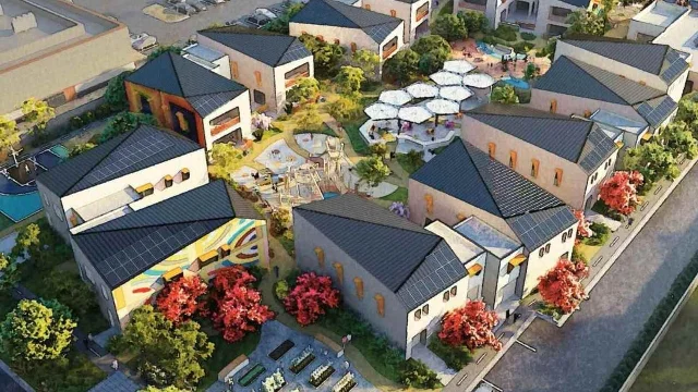 Aerial view of the Together California village design, with houses arranged around a planted courtyard