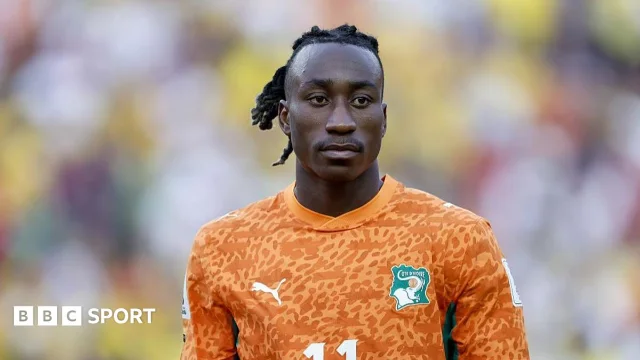 Ivory Coast player in orange kit