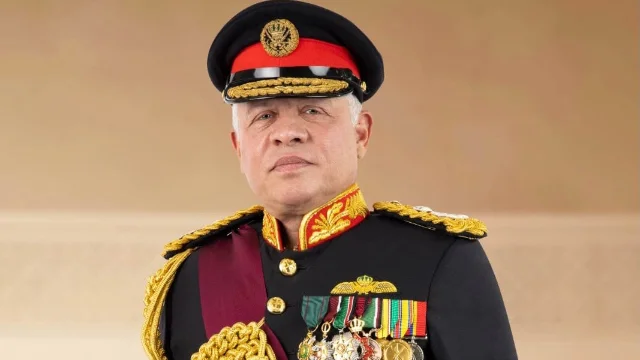 Accession anniversary — royal portrait display in Amman