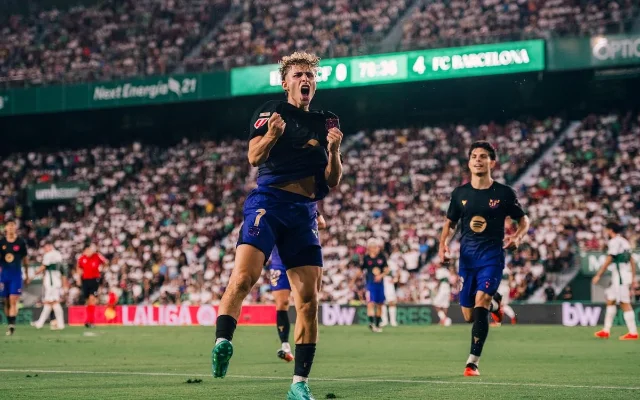 Barcelona players celebrate during the 0-5 win at Elche