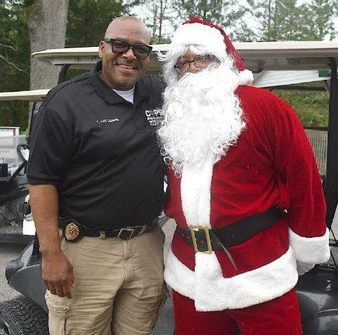 Floyd Patterson from the Middlesboro Police Department escorted Santa around the course during the tournament.