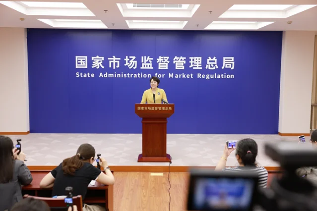 SAMR Q2 2026 press conference, female spokesperson at podium with reporters