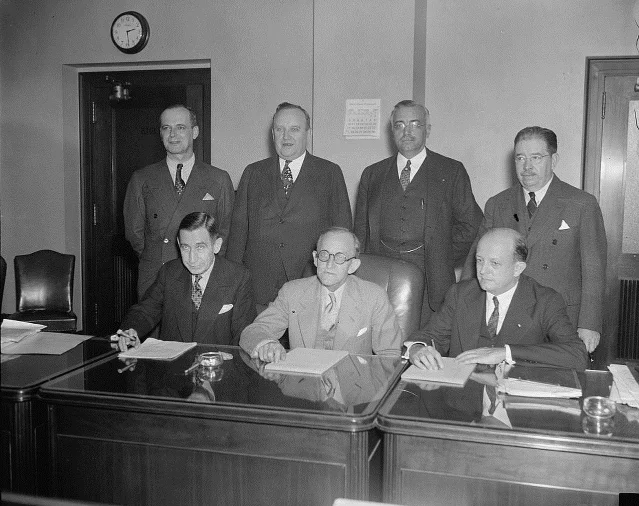 The first FCC Commission seated for an official photograph, October 6, 1937