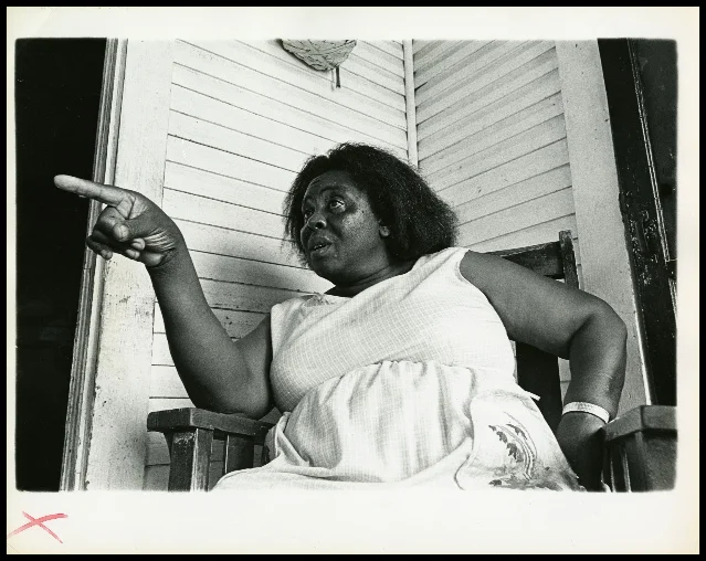 Fannie Lou Hamer sitting on her porch in Ruleville, Mississippi