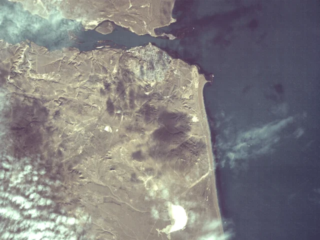 Coastal area imaged and classified by NAVI-Orbital running Gemma 3 on Yam-9