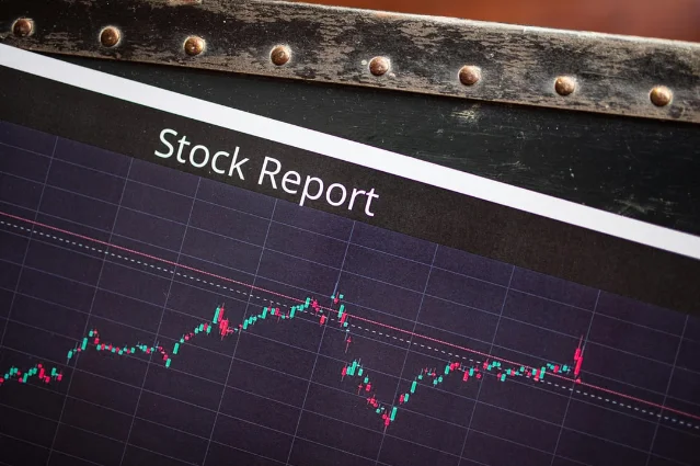 Close-up of a stock market report showing performance graph and data trends