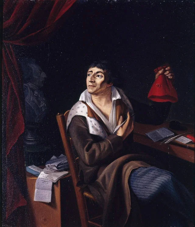 Portrait of Jean-Paul Marat seated at a desk