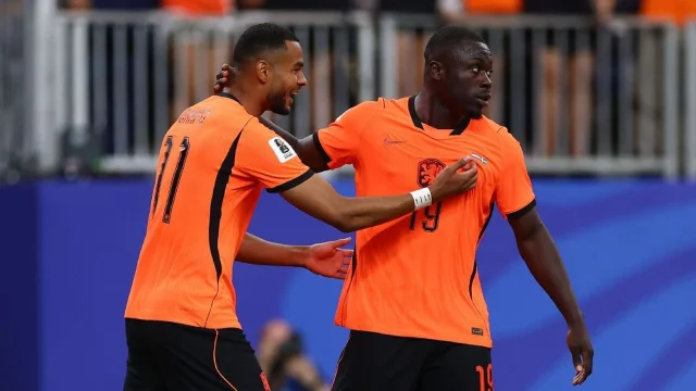 Dutch players celebrate during the win over Sweden