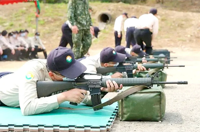 Taiwan conscripts practice shooting in a Ministry of the Interior training session