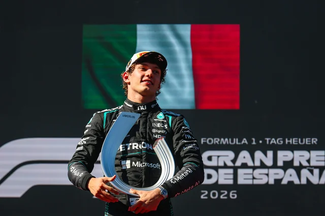 Kimi Antonelli holding the winner's trophy at the Spanish Grand Prix