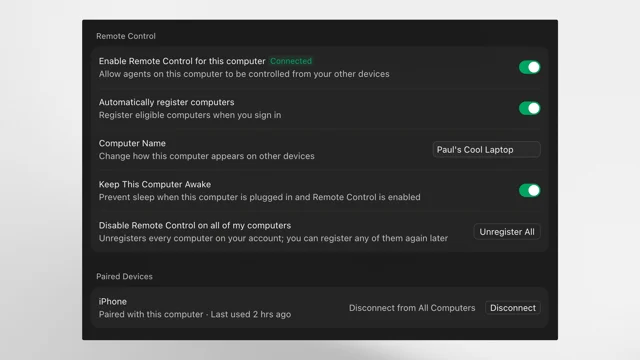 Cursor's Remote Control settings on the desktop, with the toggle enabled and connected, the computer renamed, Keep This Computer Awake on, and an iPhone listed under Paired Devices