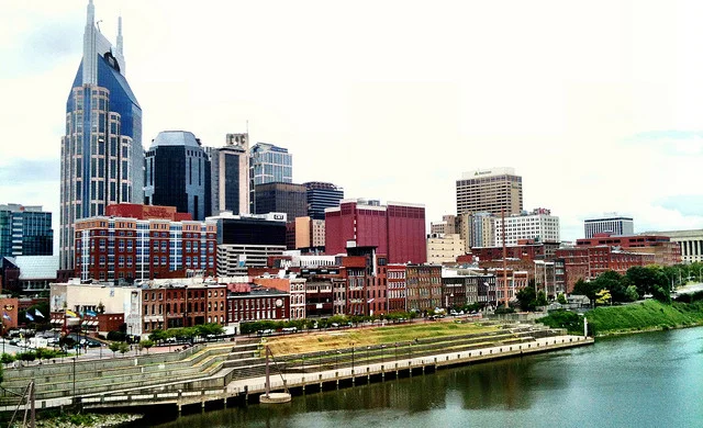 Nashville riverfront with the Cumberland River in the foreground and downtown skyline in the background