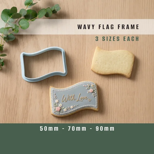 A light-blue wavy flag-frame cutter beside a plain cut cookie and a decorated frame cookie.