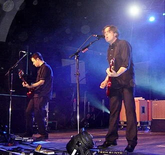 Jim Adkins and Tom Linton performing onstage