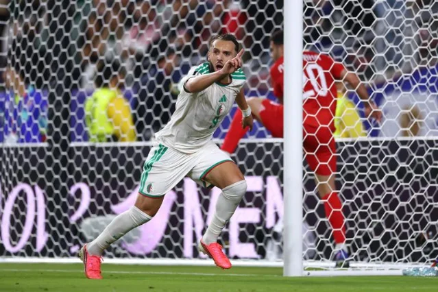 Amine Gouiri celebrates Algeria's winner against Jordan
