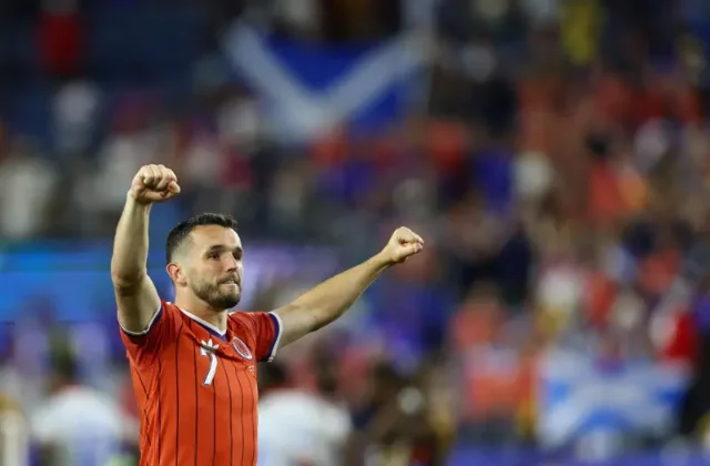 John McGinn celebrates scoring Scotland's winner against Haiti