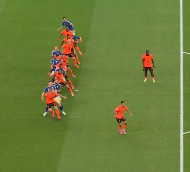 Netherlands defenders hold a sharp offside line against Sweden
