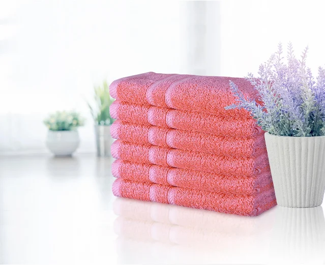 A neatly folded stack of bath towels