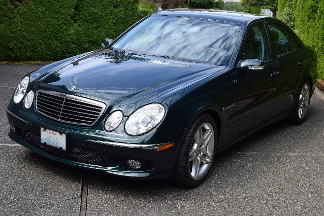 A 2005 Mercedes-Benz E55 AMG finished in Everest Green