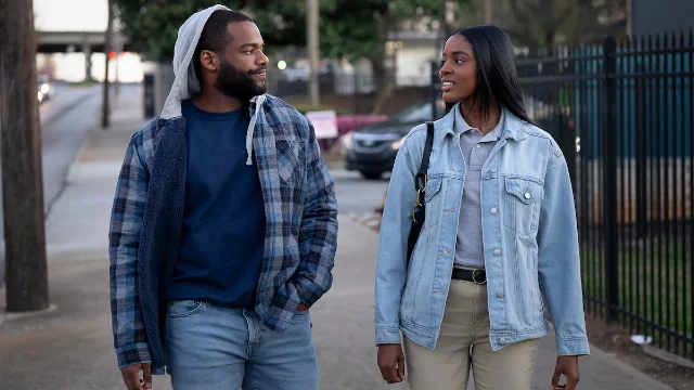Naomi Baker and Jay Reeves walking together in Tyler Perry's Doing Life