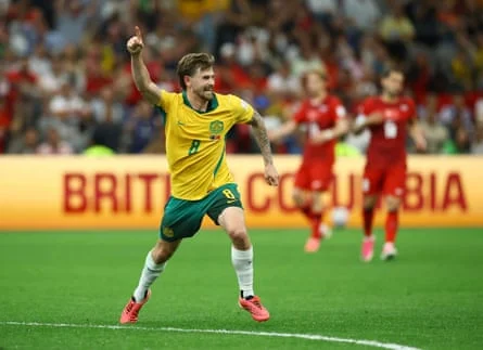 Connor Metcalfe wheels away after scoring Australia's second goal