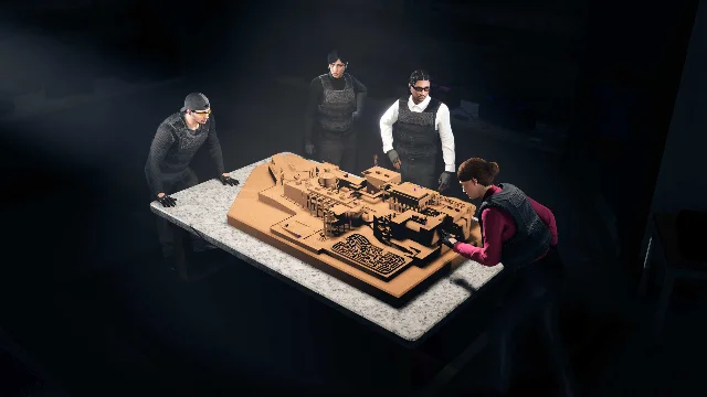 Four GTA Online characters planning a heist around a model of the Kortz Center.