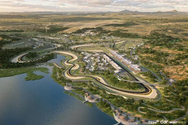 An aerial rendering of a long permanent road course with grandstands, pit buildings and water at one edge, set in dry hills