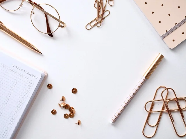 Notebook and pen on a minimalist desk