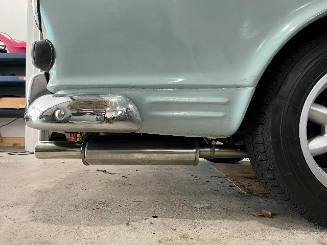 Close-up of the 1966 Volvo 122S's new exhaust and rear wheel
