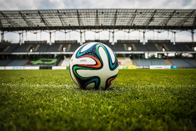 Soccer ball on stadium pitch — the apartment nobody was supposed to get