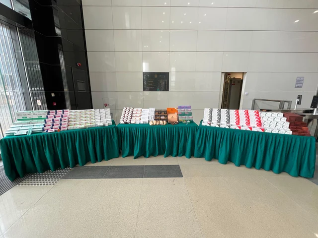 Seized goods from three HK-to-Macau river vessel smuggling cases, including pharmaceuticals, anti-obesity injections, tobacco, suspected redwood, and whale teeth