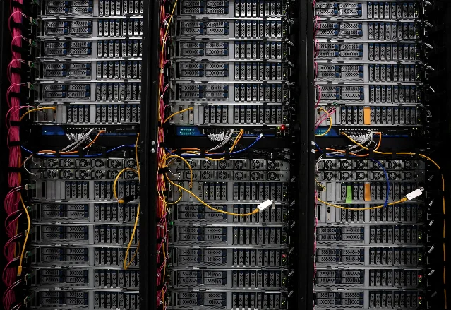Rows of server racks and cabling inside a Nebius data centre