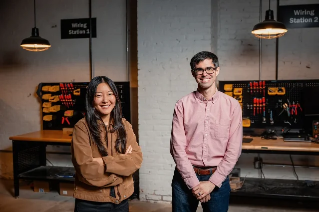 Podium Automation founders and control-panel workspace