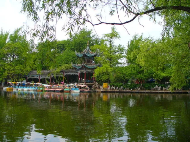 Kunming's Green Lake Park, with traditional pavilions reflected in the water