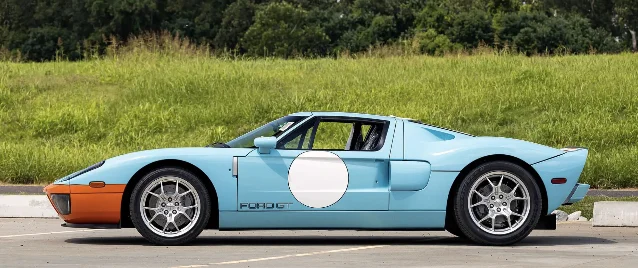 Blue-and-orange 2006 Ford GT Heritage Edition with white roundels