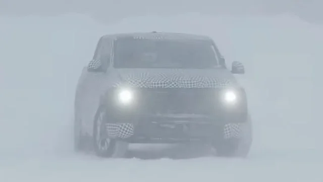 Camouflaged Ford EV pickup prototype