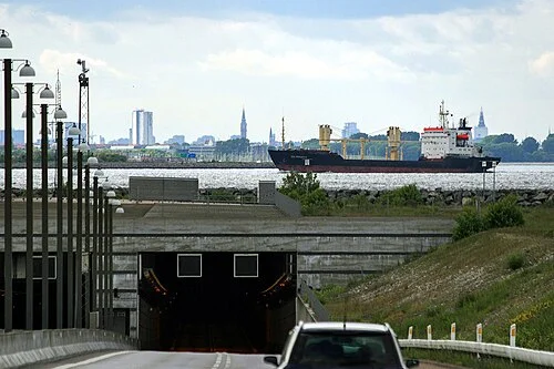 The Øresund Tunnel portal on the Danish side at Kastrup: a cargo vessel is visible in the background on the Drogden channel directly above the tunnel