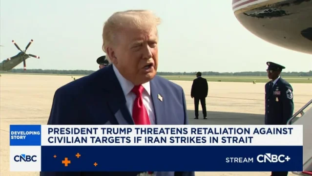Donald Trump speaking on an airfield beside Air Force One