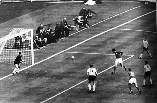 Geoff Hurst heads towards goal in the 1966 World Cup Final, England vs West Germany