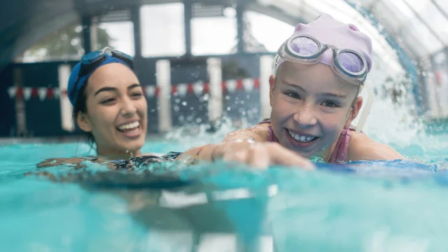People swimming in a pool