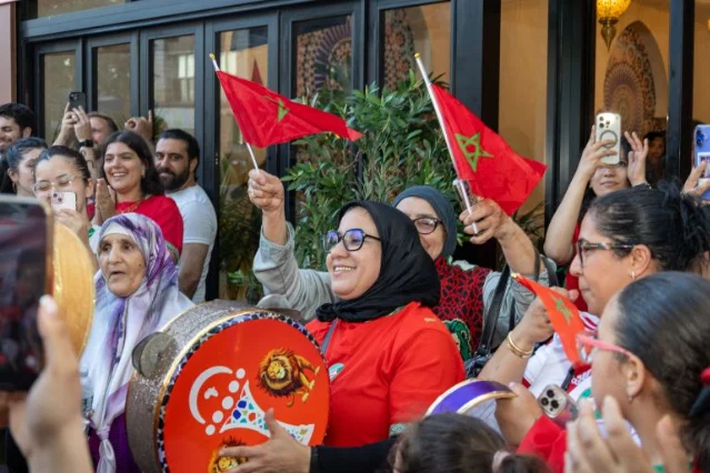 Crowd watching Morocco in Astoria