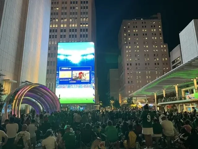 Mexican fans watch the South Korea match in downtown Dallas