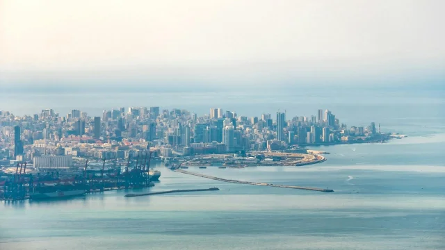 Aerial view of Beirut's Mediterranean coastline — Lebanon's political and commercial capital sits 85 km north of the new combat zone
