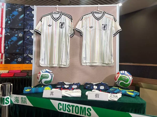 Genuine (left) and counterfeit (right) jerseys on display at the HK Customs "Clean Sheet" press conference